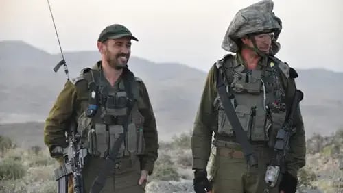 משמאל, רן כנען