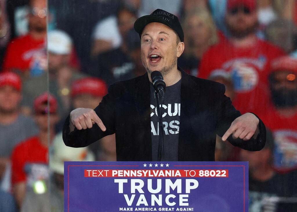 Elon Musk at a Trump rally last month 