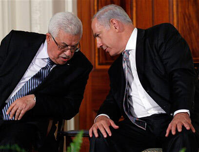 Palestinian President Abbas with Prime Minister Netanyahu (Photo: AP)