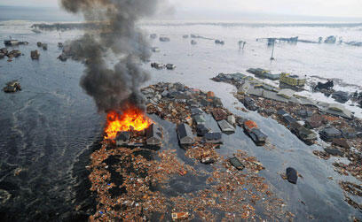 Promotional space used to market a book claiming US is a 'Jewish dictatorship state' that detonated an atomic bomb deep underwater to deliberately trigger earthquake and subsequent tsunami (AP Photo/Kyodo News) (צילום: AP Photo/Kyodo News) Promotional space used to market a book claiming US is a 'Jewish dictatorship state' that detonated an atomic bomb deep underwater to deliberately trigger earthquake and subsequent tsunami (AP Photo/Kyodo News)