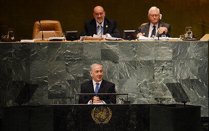 Ambassador Prosor (top left) watches Prime Minister Netanyahu address the UN General Assembly.  'This policy is leading Israel to its end as a state with a stable Jewish majority' (Photo: Shahar Azran)