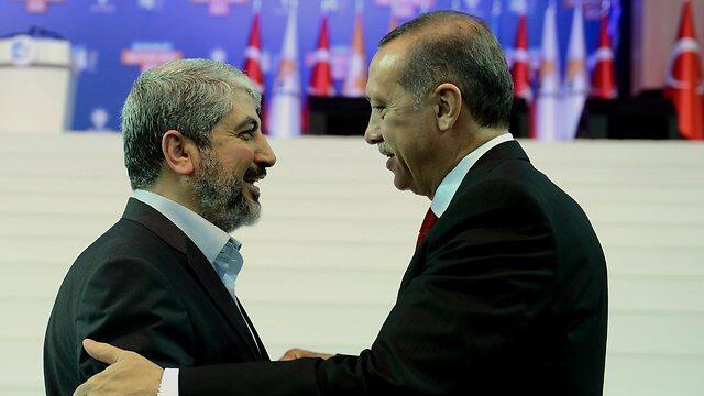 Hamas political leader Khaled Mashal, left, with Turkish President Erdogan in Turkey last year. (Photo: AP)