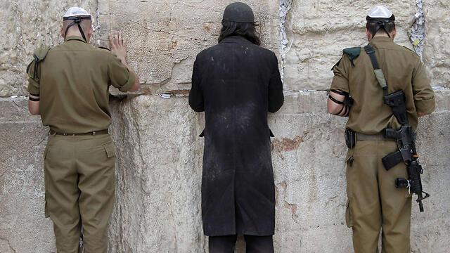 Netanyahu: "Military service in the IDF is a source of pride". (Photo: AFP) (צילום: AFP) Netanyahu: "Military service in the IDF is a source of pride". (Photo: AFP)