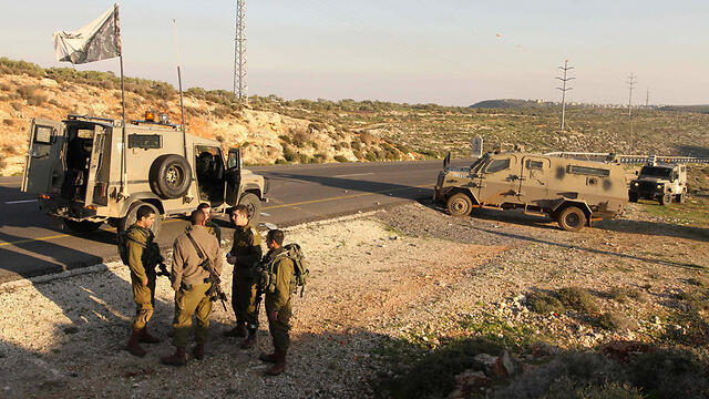 IDF forces deployed in the area near Qusra following the shooting