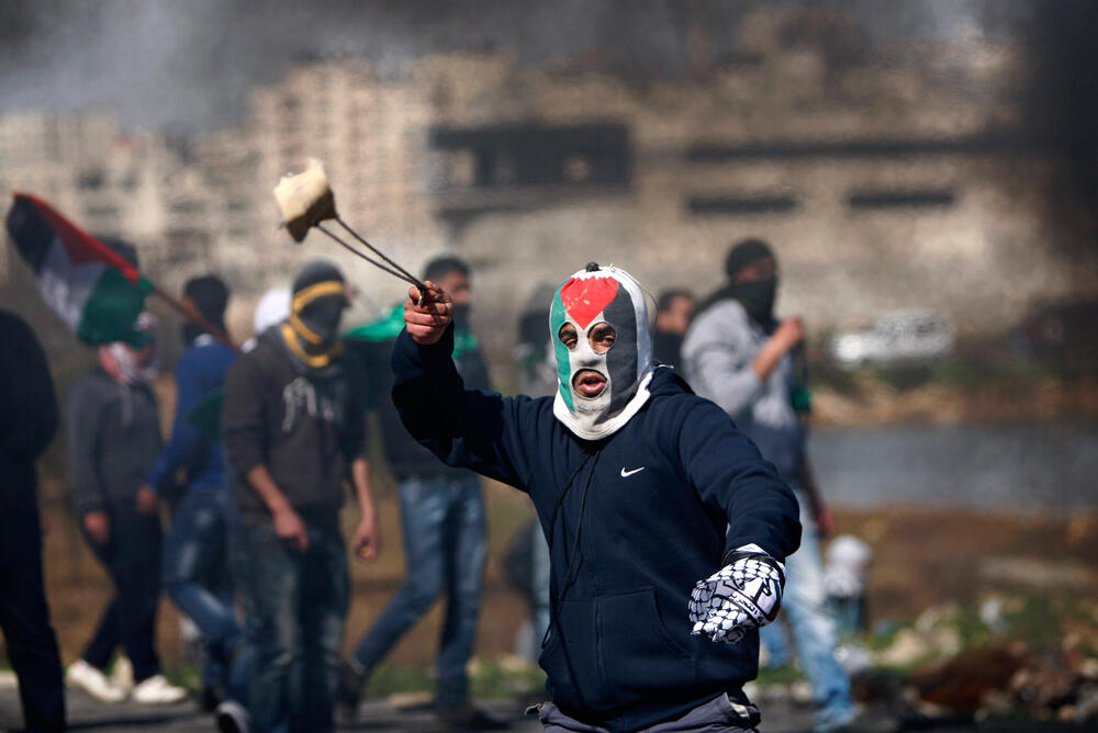 Palestinians protest conditions of hunger-striking Palestinian prisoners held in Israeli prison 
