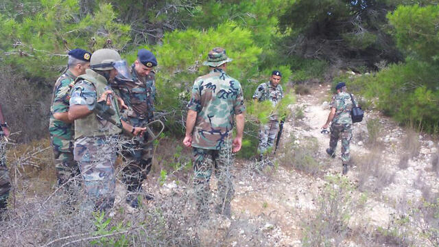 Lebanese soldiers at the scene of the explosion