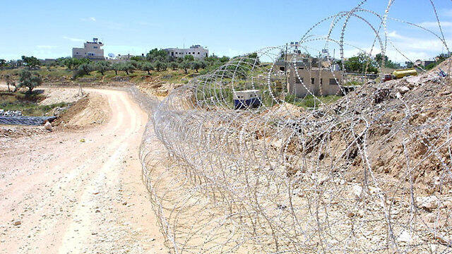 The seperation fence. (Photo: Dan Balilty) (צילום: דן בלילטי) The seperation fence. (Photo: Dan Balilty)