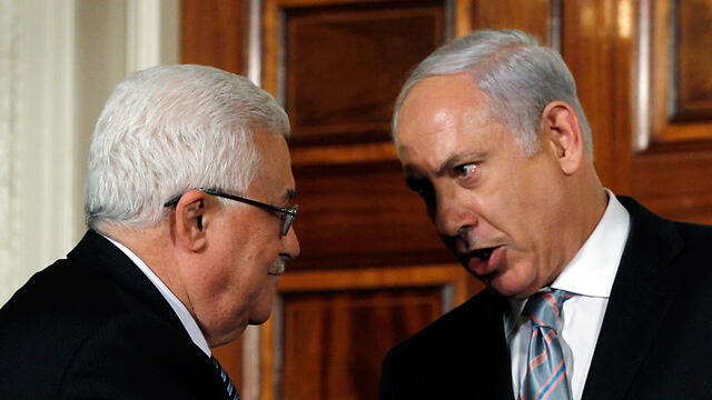 Prime Minister Benjamin Netanyahu (R) and Palestinian President Mahmoud Abbas (Archive photo: Reuters)