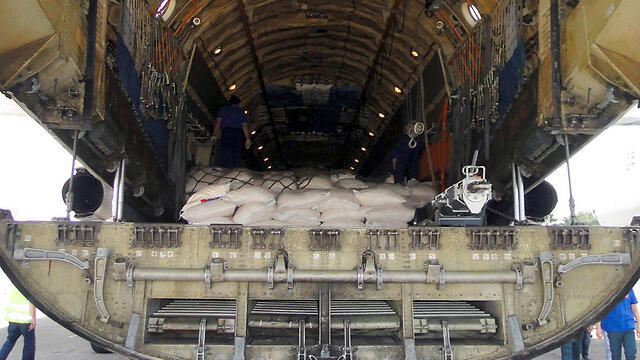 Russian cargo planes in Syria (Photo: AFP) (צילום: AFP PHOTO / HO / SANA) Russian cargo planes in Syria (Photo: AFP)