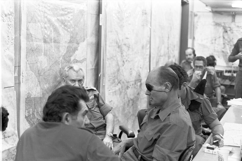 Dayan (right) in consultations 
