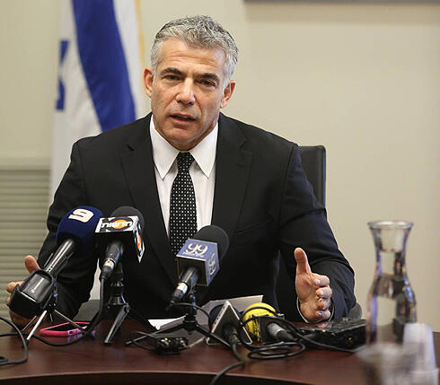 Finance Minister Yair Lapid (Photo: Gil Yochanan)