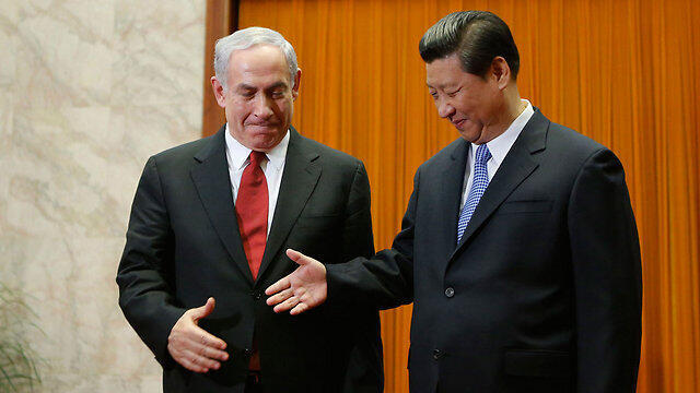 Prime Minister Netanyahu with Chinese President Xi Jinping during his visit to Beijing in 2013 (Photo: AFP)