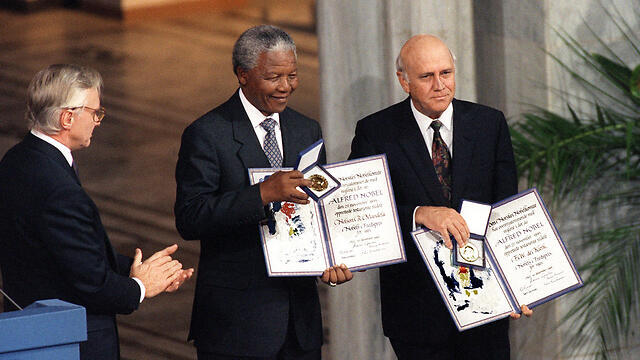 Mandela and de Klerk receive the Nobel Peace prize, 1993. Ties to Apartheid South Africa became an albatross around Israel's neck (Photo: AFP) (צילום: AFP) Mandela and de Klerk receive the Nobel Peace prize, 1993. Ties to Apartheid South Africa became an albatross around Israel's neck (Photo: AFP)