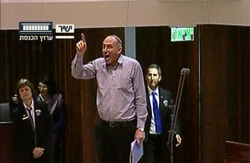 Habayit Hayehudi MK Mordechai Yogev storms out of the Knesset (Photo: Knesset Channel) 