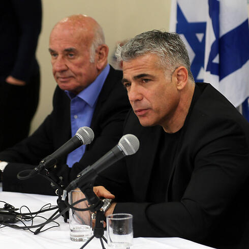 Science Minister Yaakov Perry and Finance Minister Yair Lapid (Yogev Atias)