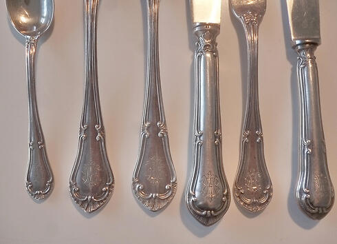 The silver set. 'We believe it was a family inheritance'