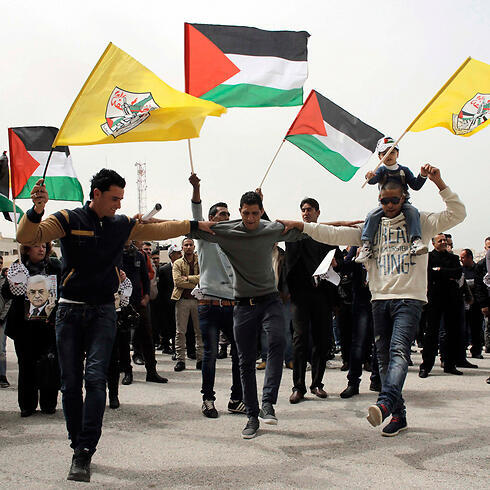 Palestinians dancing during protest (Photo: Reuters)