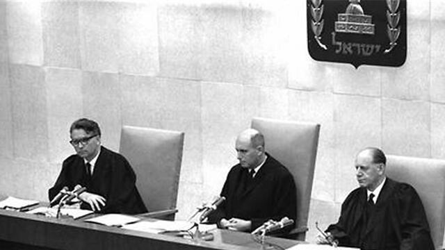 Presiding Judges Yitzhak Raveh, Benjamin Halevi, and Moshe Landau