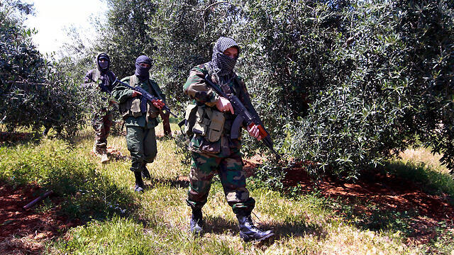Hezbollah militants on the Syria-Lebanon border (Photo: AP)