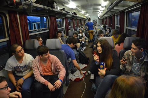 Passengers on their way to the march (Photo: Moshe Milner)