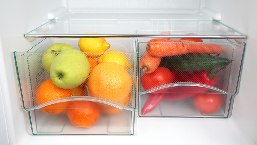 If you must wash fruits and vegetables before putting them in the refrigerator then you must dry them completely 