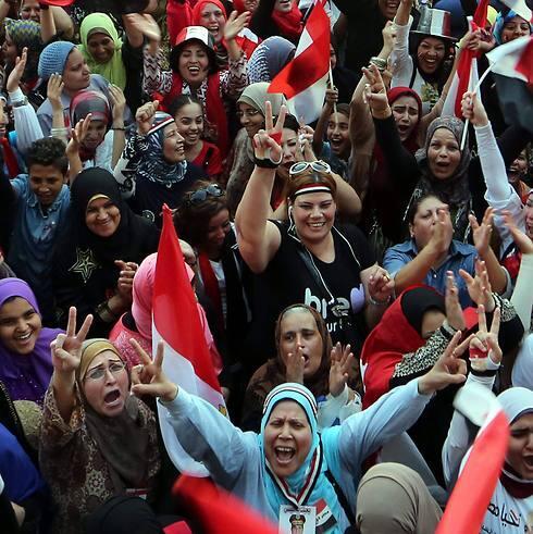 Egyptian people celebrate the outcome of Egypt's presidential elections at Tahrir Square in in Cairo, Egypt (Photo: EPA) (EPA) Egyptian people celebrate the outcome of Egypt's presidential elections at Tahrir Square in in Cairo, Egypt (Photo: EPA)