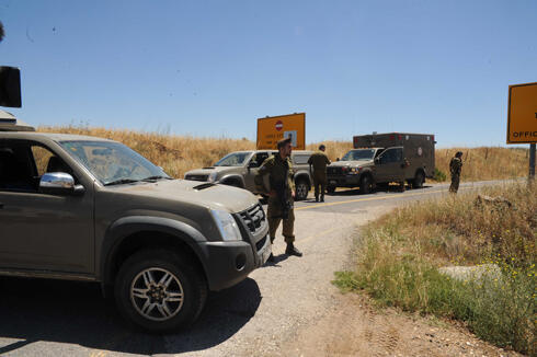 IDF troops at scene of the attack (Photo: Avihu Shapira)