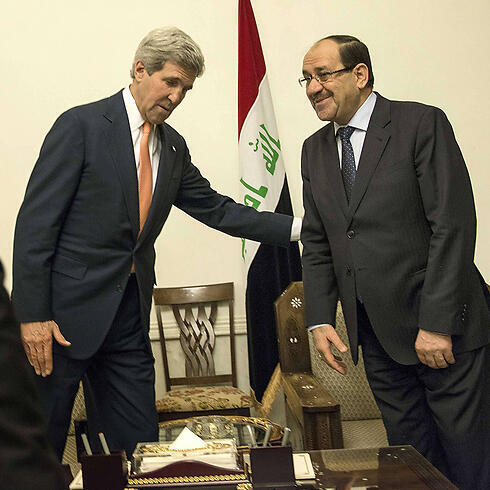 US Secretary of State John Kerry and Iraqi Prime Minister Nouri al-Maliki (Photo: AFP) 