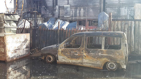 Sderot facotry caught fire after a hit by a rocket (Photo: Roee Idan)