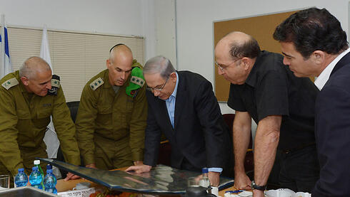 'The only thing that interested him was to be photographed on the backdrop of maps' (Photo: Haim Tsach/GPO)