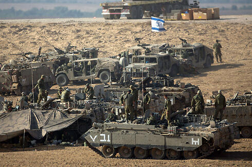 Israeli troops amassing on the Gaza border (Photo: AFP)