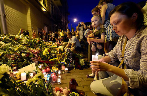 Траур по погибшим пассажирам в Нидерландах. Фото: AFP (צילום: AFP) Траур по погибшим пассажирам в Нидерландах. Фото: AFP