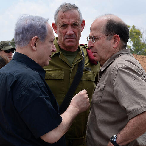 Netanyahu, Ya'alon, and Chief of Staff Benny Gantz got the funds they requested for Operation Protective Edge. (Photo: GPO) (צילום: קובי גדעון, לע"מ) Netanyahu, Ya'alon, and Chief of Staff Benny Gantz got the funds they requested for Operation Protective Edge. (Photo: GPO)