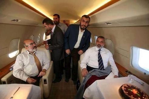 Mashal in a private jet with senior Hamas officials