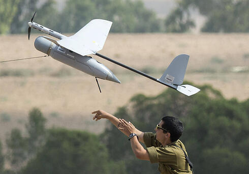 Hamas trying to bring down Israeli drones. (Photo: AFP)