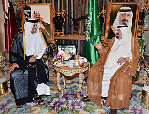 Emir of Qatar Tamim bin Hamad Al Thani and Saudi King Abdullah (Photo: Reuters)