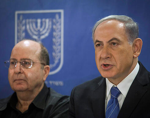 Prime Minister Netanyahu with Defense Minister Moshe Ya'alon (Photo: Reuters)