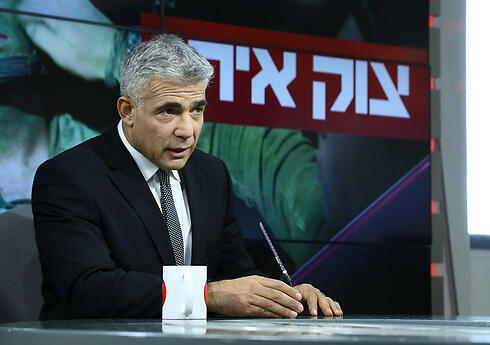 Finance Minister Yair Lapid talking to Ynet (Photo: Ofer Amram)
