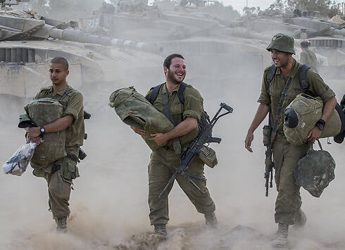 IDF troops leaving Gaza (Photo: AFP)