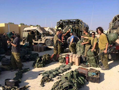 Just like in Gaza, just harder. Reservists returning their equipment at the end of Protective Edge.