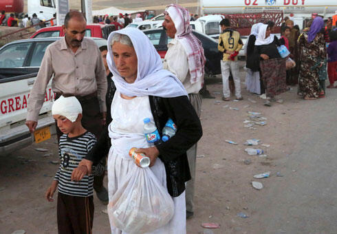 Yazidi refugees on the border of Iraq and Syria (Photo: AP)