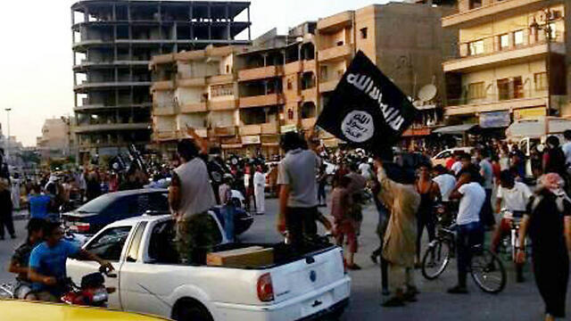 "Исламское государство" в Сирии. Фото: AP (צילום: AP) "Исламское государство" в Сирии. Фото: AP