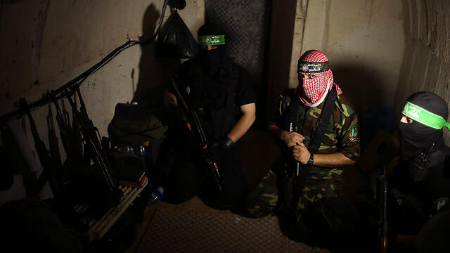 Hamas militants inside a Gaza tunnel (Photo: Reuters) (צילום: רויטרס) Hamas militants inside a Gaza tunnel (Photo: Reuters)