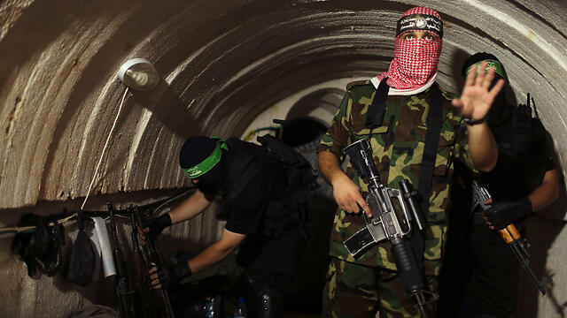 Hamas fighters inside a terror tunnel in Gaza