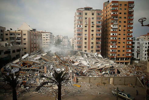 Rubble in Gaza after IDF strike during Operation Protective Edge (Photo: Reuters) (צילום: רויטרס) Rubble in Gaza after IDF strike during Operation Protective Edge (Photo: Reuters)