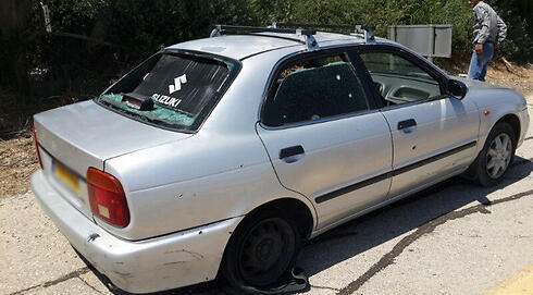 Damage sustained to Palestinian's car (Photo: Yoav Zitun)