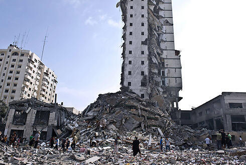 Destroyed high-rise building in Gaza (Photo: AFP)