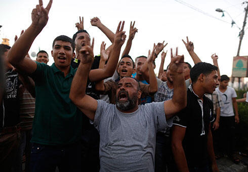 Gazans celebrate announcement of long-term ceasefire (Photo: Reuters)