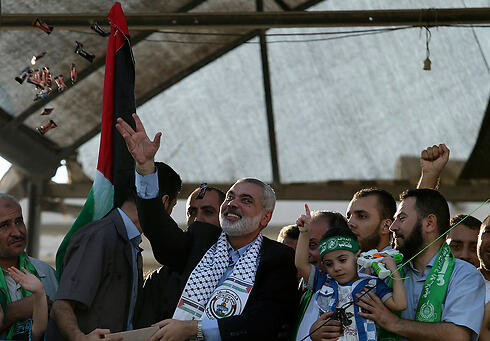 Hamas leaders celebrating victory in the fighting in Gaza (Photo: Reuters) (צילום: רויטרס) Hamas leaders celebrating victory in the fighting in Gaza (Photo: Reuters)