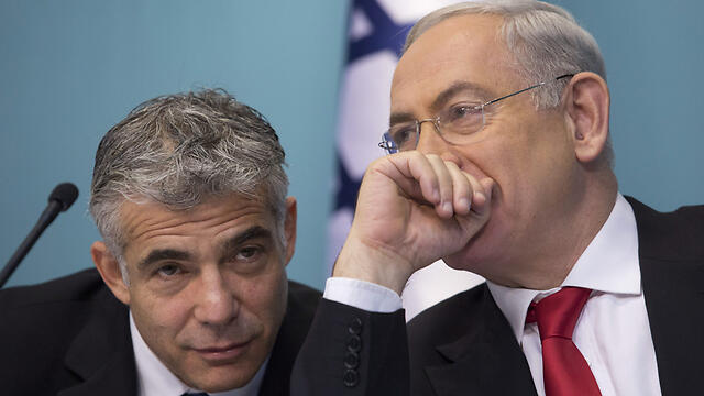 Netanyahu and Lapid seen in happier times. (Photo: EPA) (צילום: EPA) Netanyahu and Lapid seen in happier times. (Photo: EPA)